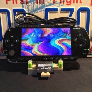 Sony PSP 1000 with Charger, Memory Stick, & Games